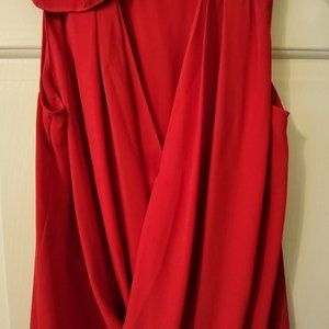 Fall and the holidays are coming! Enjoy your day in this beautiful draped  top.